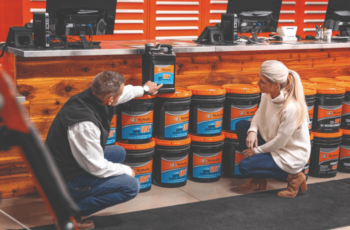 Kubota employee helping customer